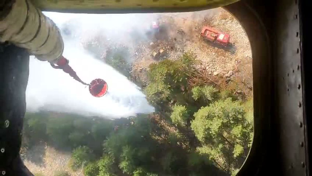 Muğla'daki Yılanlı Dağı'nda Yangın: 3 Helikopter ve 5 Arazözle Müdahale Sürüyor