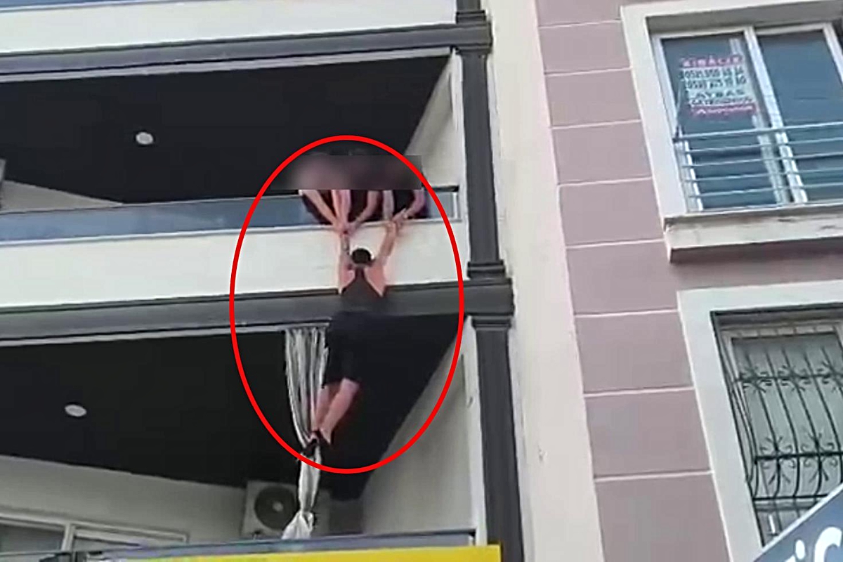 İş yeri kurşunlayan şüphelinin balkondan kaçmaya çalıştığı anlar kamerada