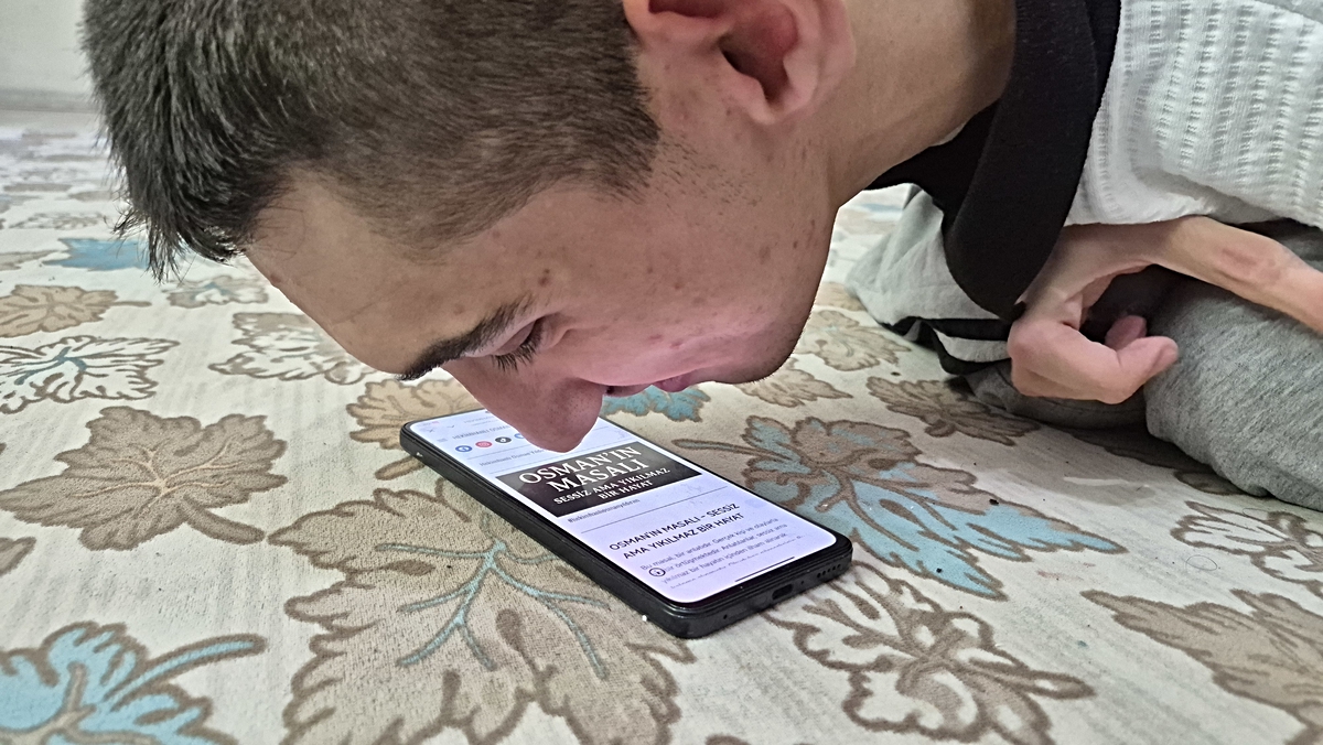 Burnu ile cep telefonu kullanan ‘serebral palsili’ Osman’ın hedefi kitap yazmak