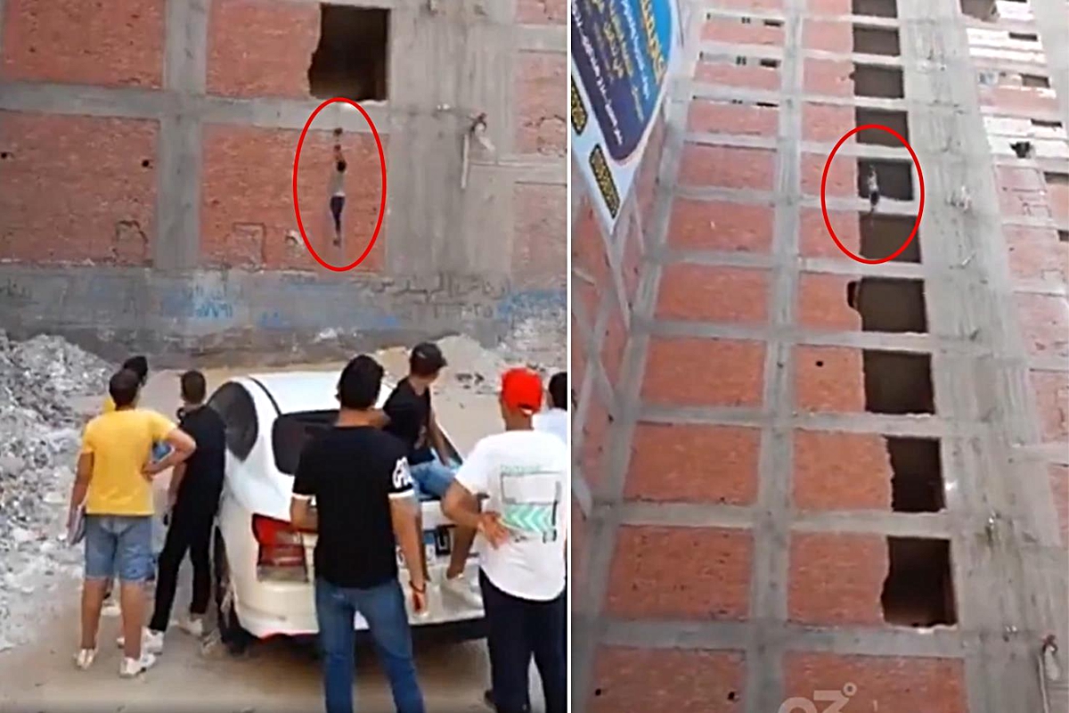 İnşaatta akılalmaz yöntem! İşçileri halatla taşıdılar