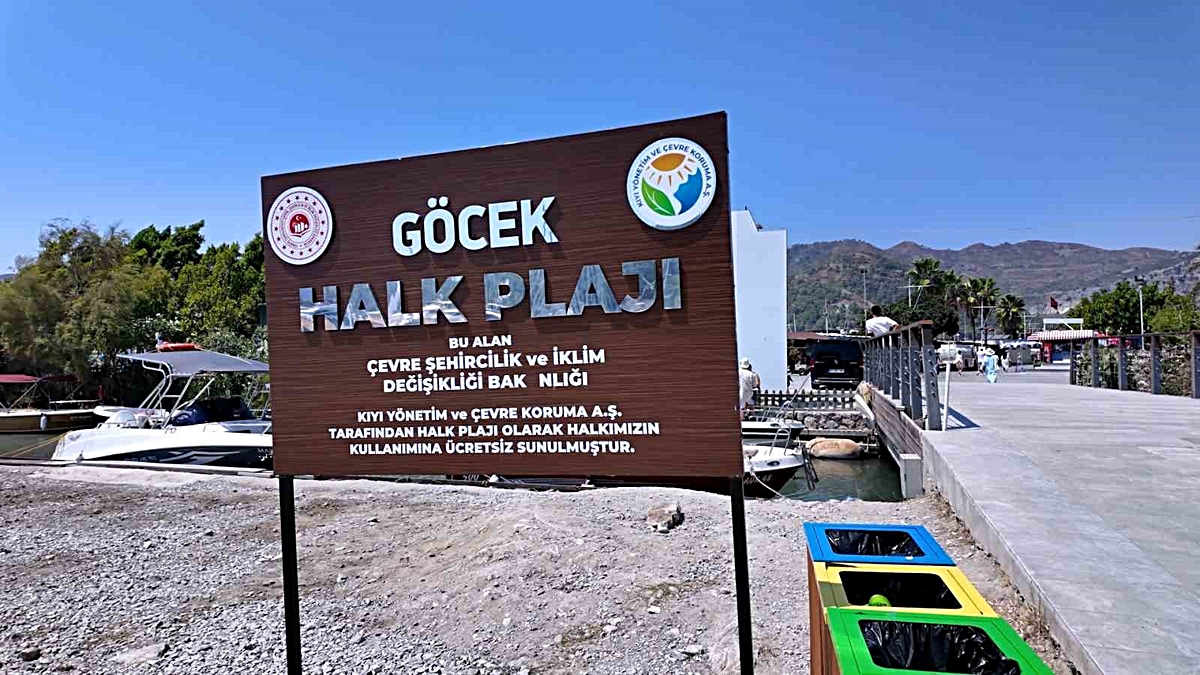 Bakan Kurum, Göcek'te teknelerden temizlenen ücretsiz halk plajını hizmete açtı