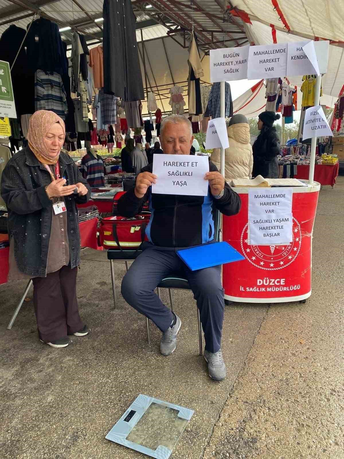 Düzce Çilimli'de pazaryerinde açılan stantta vatandaşlara kas gücü ölçümü yapıldı