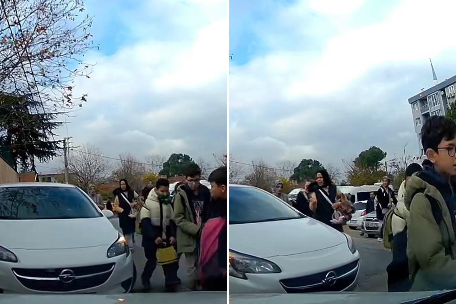 Okuldan çıkan öğrencilerin üzerine araba sürdü