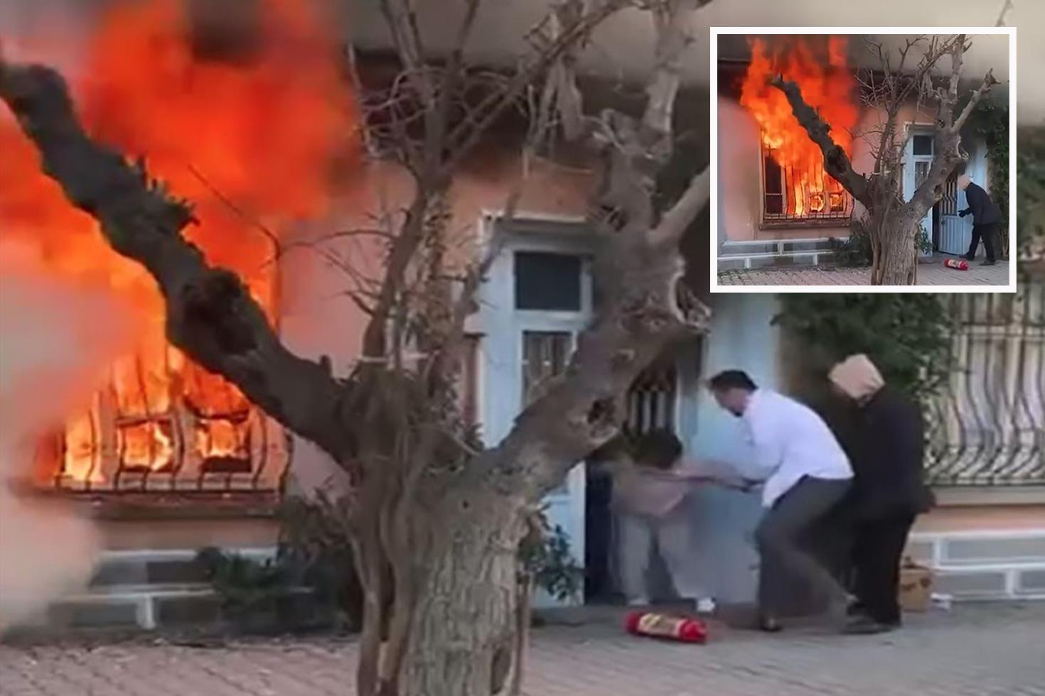 Kedisini kurtarmak için alevlerin içine daldı, komşuları güçlükle dışarı çıkardı