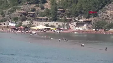 MUĞLA KIZKUMU'NA TURİST YAĞIYOR