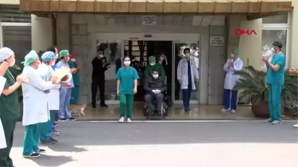 KORONAVİRÜSÜ YENEN DOKTOR ALKIŞLARLA TABURCU EDİLDİ aktüel görüntü