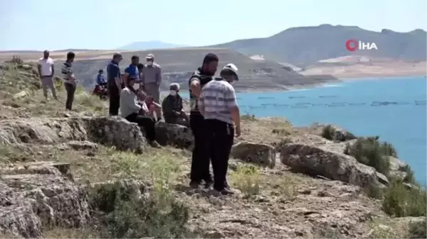 Serinlemek için baraj gölüne giren iki gençten biri boğuldu