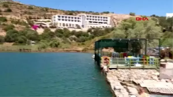 MUĞLA Denize 50 metre mesafedeki göl, tatilcilerin ilgi odağı