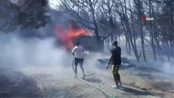 Yusuf Güney, Bozcaada'daki yangın söndürme çalışmalarına katıldı