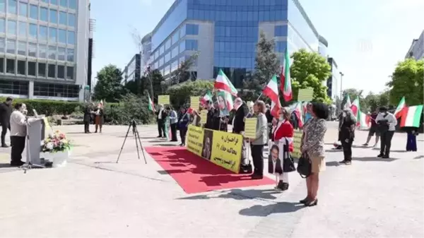 İran'ın yeni Cumhurbaşkanı Reisi Brüksel'de protesto edildi