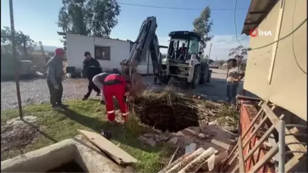 Kuyuya düşen inek böyle kurtarıldı