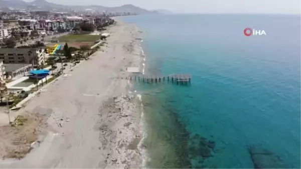 Deniz suyu çekildi... Sular altında kalan kayalıklar gün yüzüne çıktı