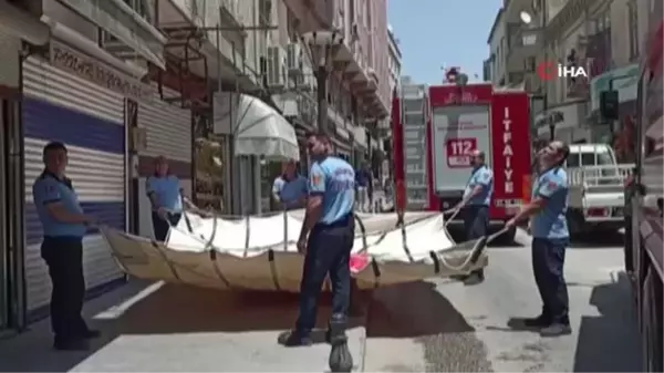 Polis operasyonunda baltalı zanlı paniği