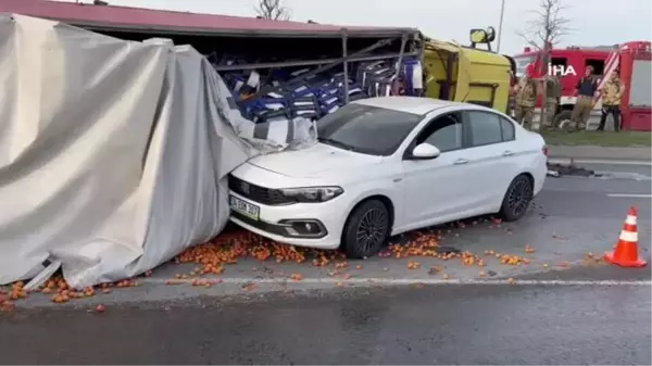 Başakşehir'de kontrolden çıkan tır otomobilin üzerine devrildi: 2 yaralı