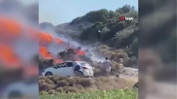 Urla'da mangal yangını denizden su taşınarak söndürüldü