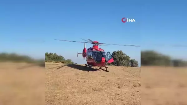 Dağlık alana düşen paraşütçü ambulans helikopterle hastaneye sevk edildi