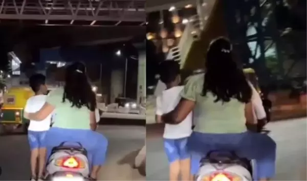 Hindistan'da trafikte scooter'la tehlikeli yolculuk: Anne ve baba, çocuklarını ayaklıkta ayakta tutarak yolculuk yaptı