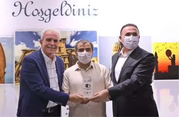 DHA MARDİN MUHABİRİ SELİM KAYA'NIN FOTOĞRAFINA ÖZEL ÖDÜL