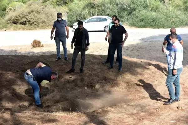 Antalya'da mezar şeklindeki tümsek polisi alarma geçirdi