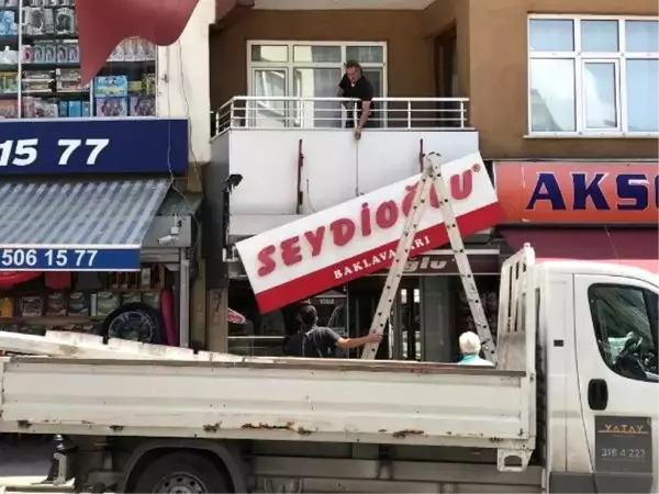 Sahipleri hamile kadının aracına saldırmıştı! Seydioğlu'nun tabelaları indiriliyor