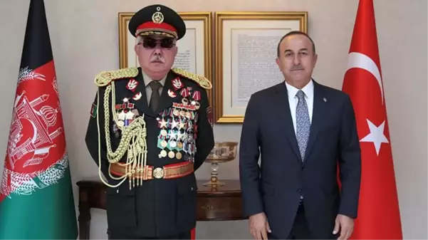 Mevlüt Çavuşoğlu'nun görüştüğü Mareşal Raşid Dostum'un üniformasındaki madalyalar dikkat çekti