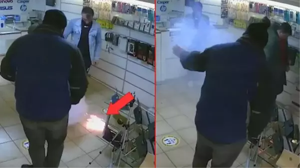 Uyarılara aldırış etmeyen müşteri az daha canından oluyordu! Telefon bataryasının bomba gibi patladığı anlar kamerada