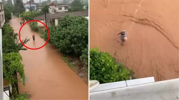 Selin etkili olduğu Bursa'nın İznik ilçesinde bir kişi göle dönen sokakta duş aldı