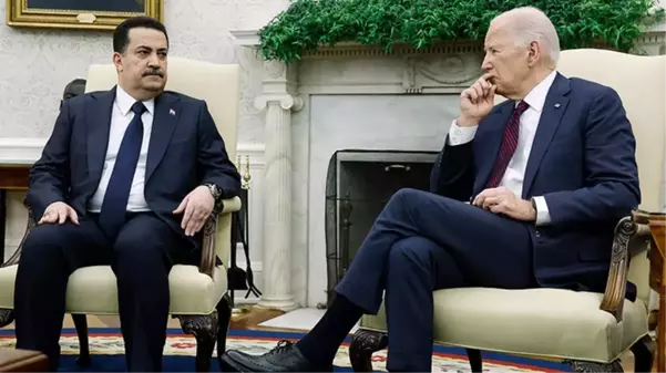 ABD Başkanı Biden, Irak Başbakanı ile görüşürken saatiyle oynadı