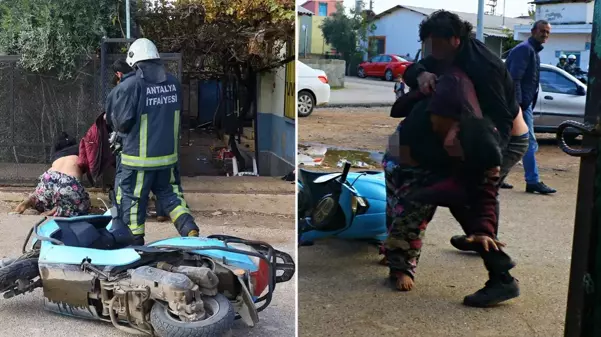 Yangını görünce eşini tekme tokat dövmeye kalktı