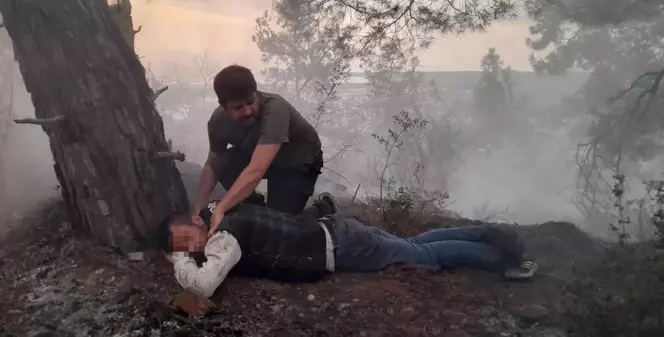 Antalya'da orman yangınını çıkaran şahıs, küle dönen alanın ortasında yerde yatarken bulundu